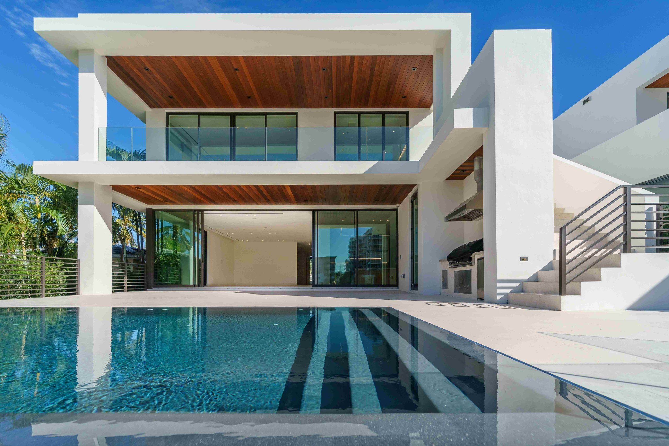 Luxury modern home with timber ceilings and an infinity pool